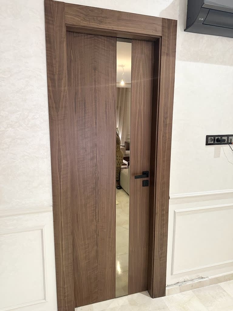 Boiserie sur mesure par YASMINA HOME — réalisation 9