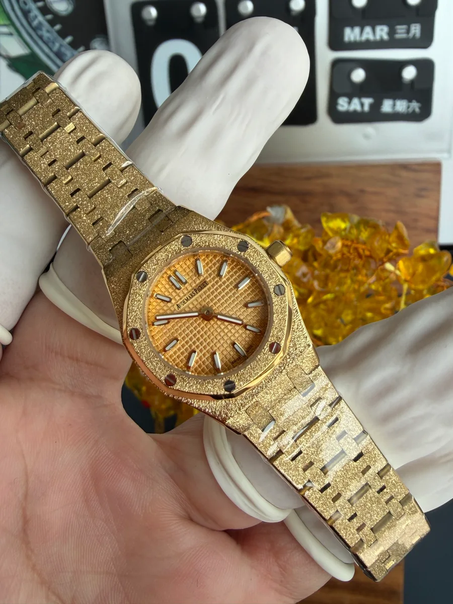 Audemars Piguet Royal Oak Mini Frosted Yellow Gold 67630BA Lady Quartz 23mm Super Clone Watch - Angle 2 - Jack Watches USA