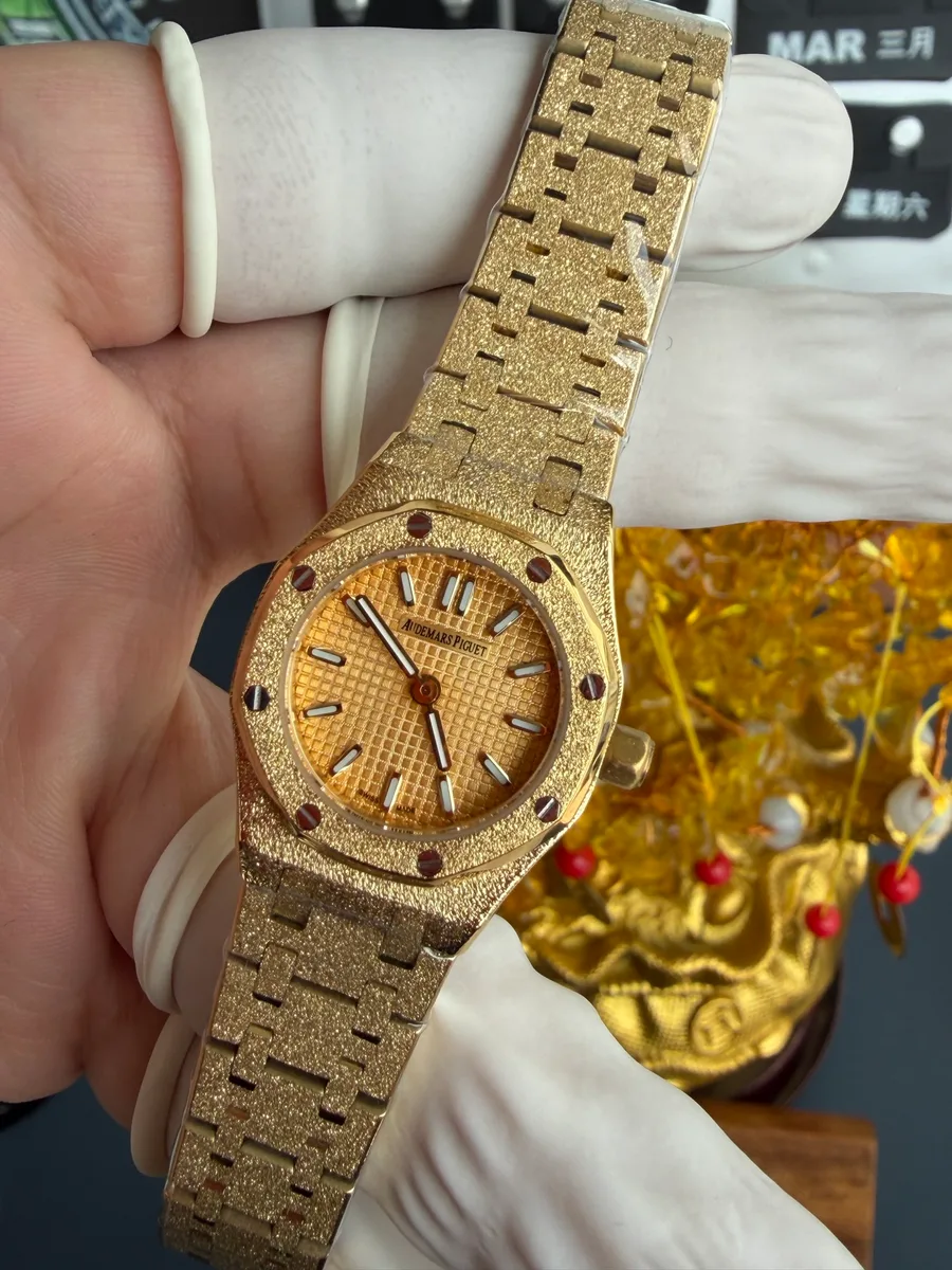 Audemars Piguet Royal Oak Mini Frosted Yellow Gold 67630BA Lady Quartz 23mm Super Clone Watch - Angle 3 - Jack Watches USA
