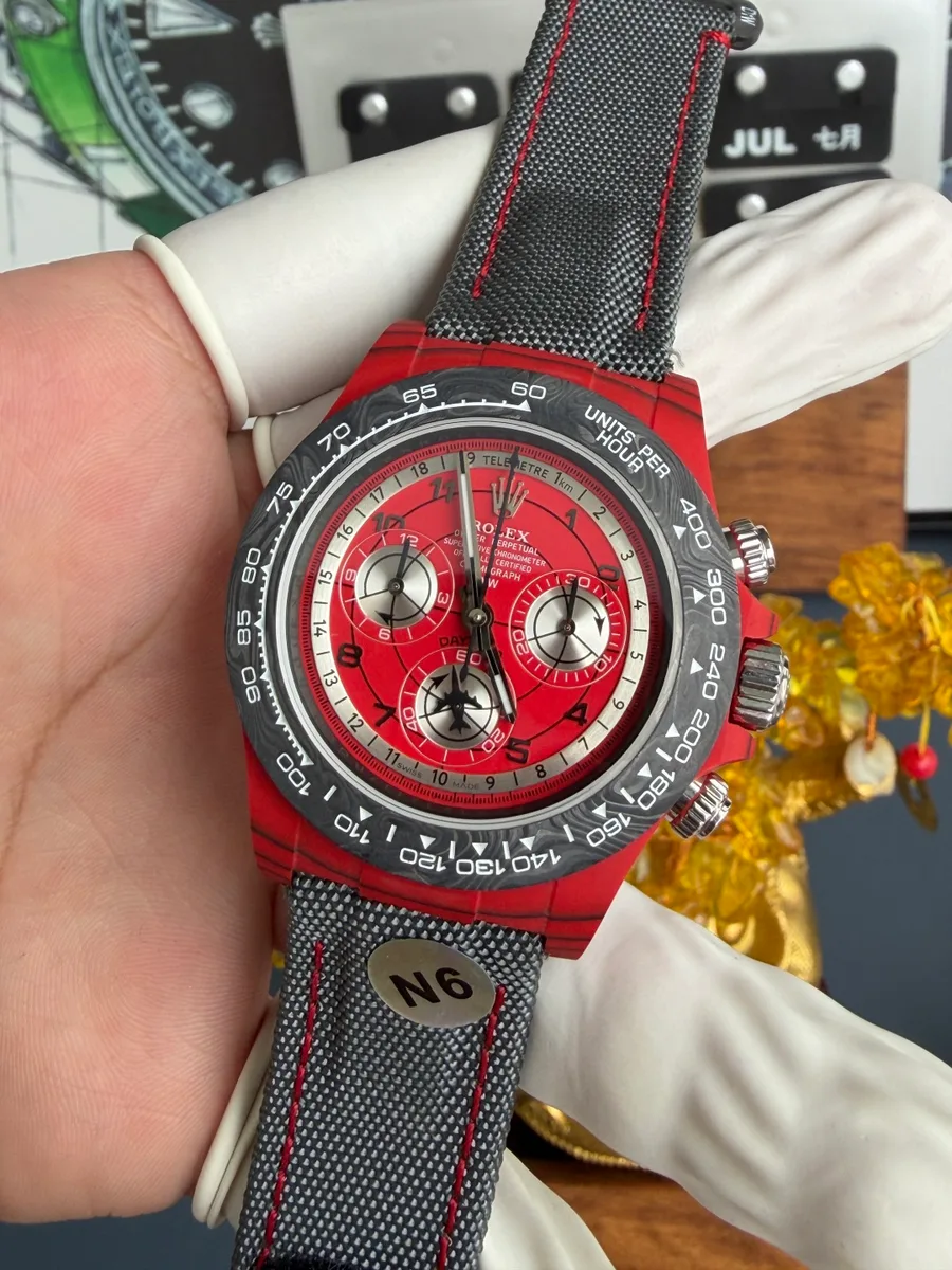 Avia Red Rolex DiW Daytona CarboQuartz Textile Strap N6F 40mm Super Clone Watch - Angle 3 - Jack Watches USA