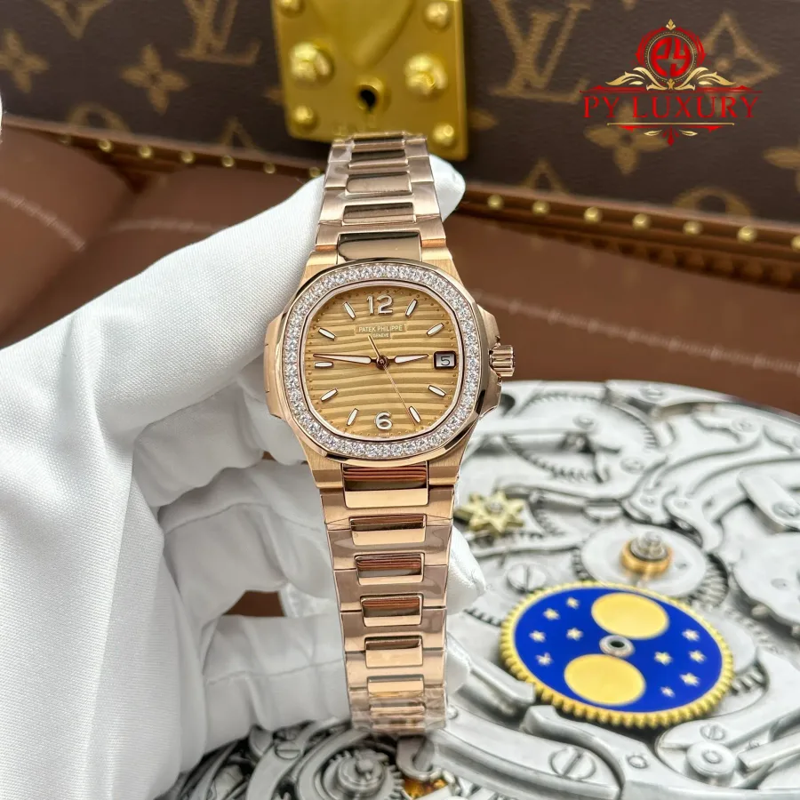 Patek Philippe Nautilus 7010/1R-012 Rose Gold Golden Dial Diamond Bezel Quartz 32mm Super Clone Watch - Angle 2 - Jack Watches USA