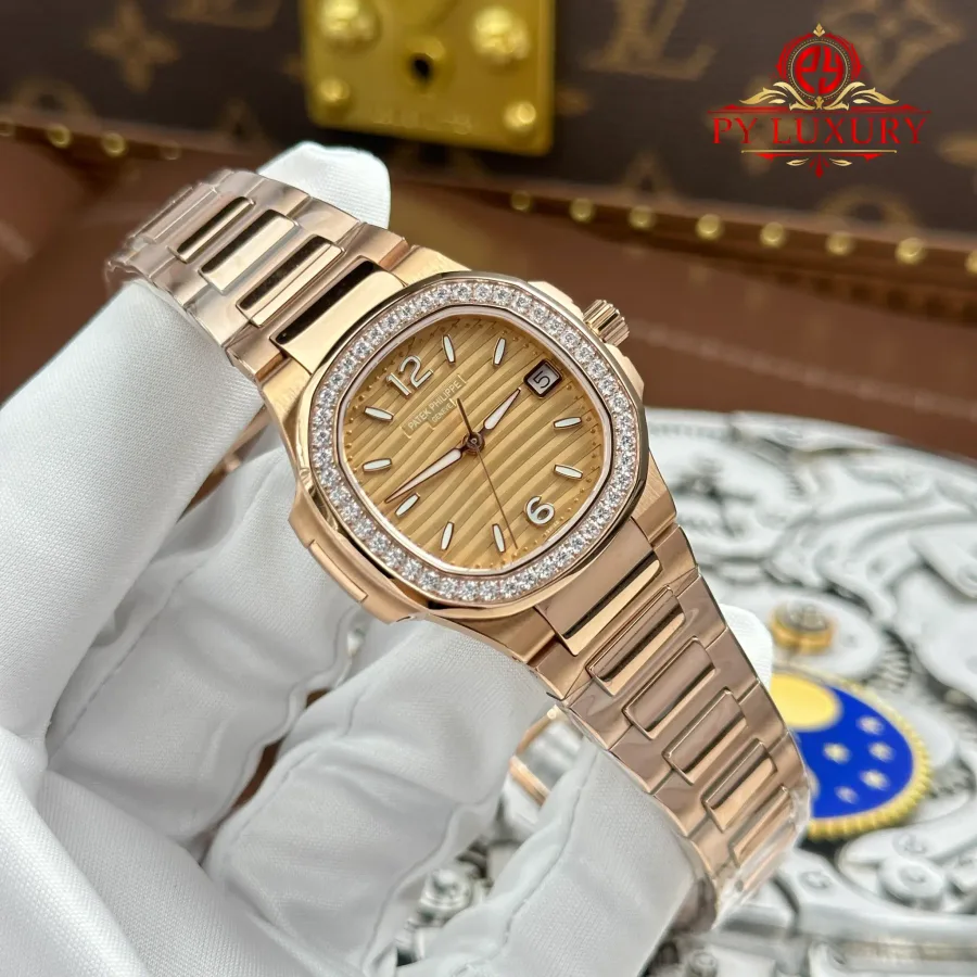 Patek Philippe Nautilus 7010/1R-012 Rose Gold Golden Dial Diamond Bezel Quartz 32mm Super Clone Watch - Angle 3 - Jack Watches USA