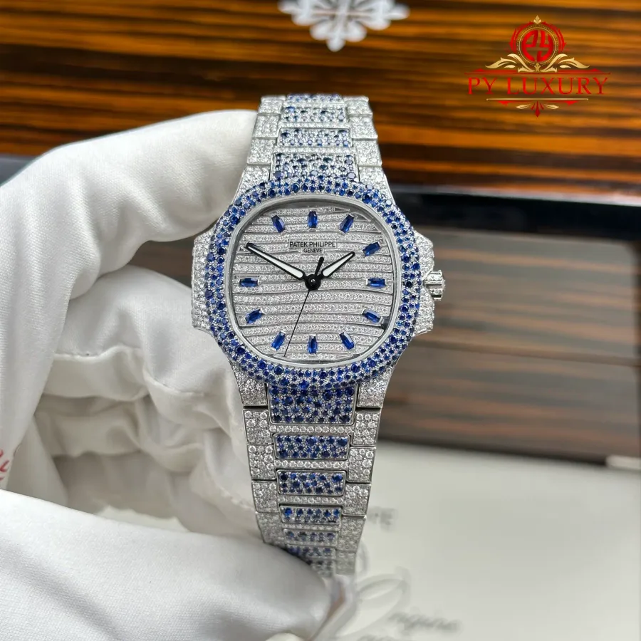 Patek Philippe Nautilus 7118/1451G-001 Custom Moissanite & Blue Sapphire Paved 35.2mm Super Clone Watch - Angle 2 - Jack Watches USA
