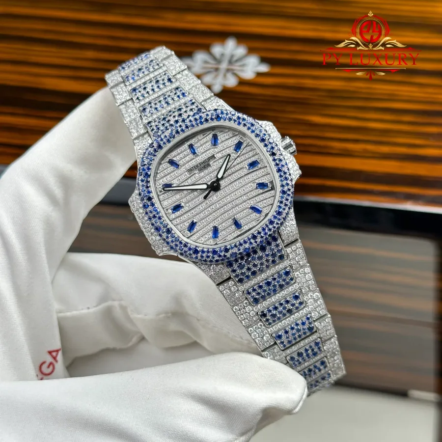 Patek Philippe Nautilus 7118/1451G-001 Custom Moissanite & Blue Sapphire Paved 35.2mm Super Clone Watch - Angle 3 - Jack Watches USA