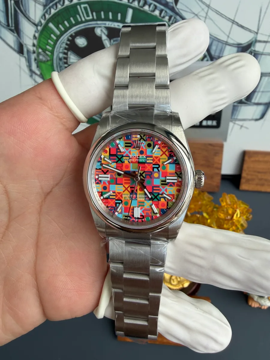 Rolex Oyster Perpetual 126000-0016 Multicoloured Jubilee-Motif Dial QF 36mm