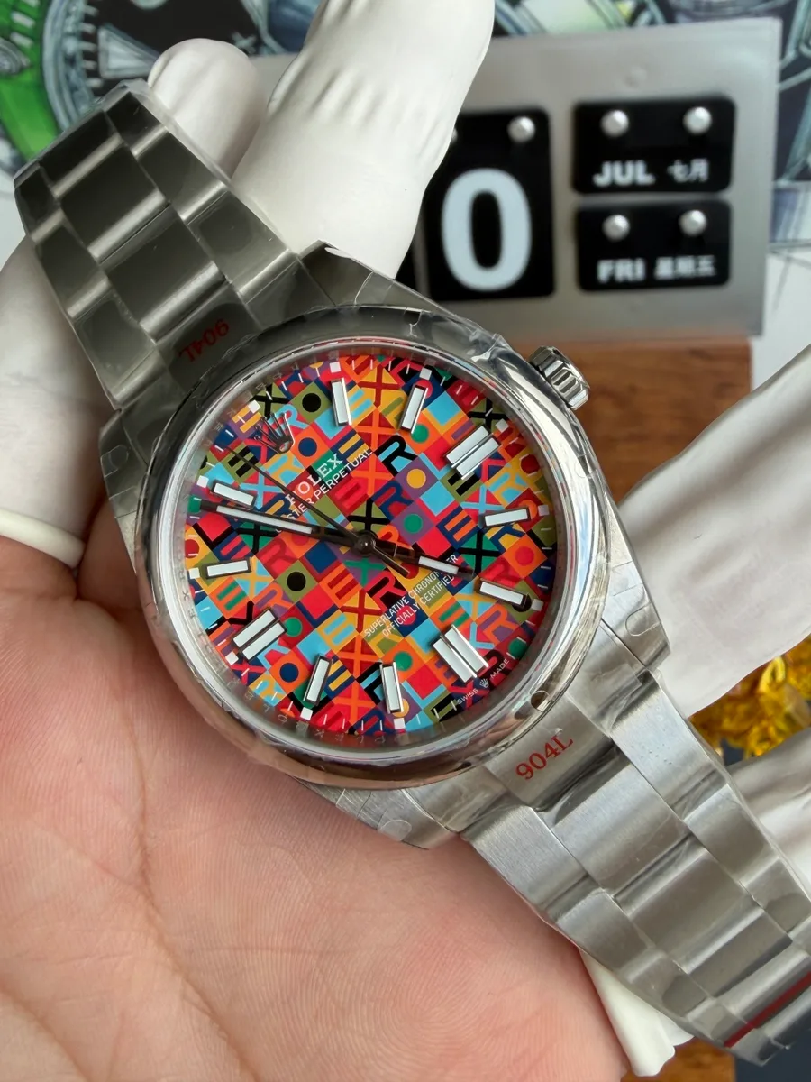 Rolex Oyster Perpetual 134300-0010 Multicoloured Jubilee-Motif Dial QF 41mm Super Clone Watch - Angle 2 - Jack Watches USA