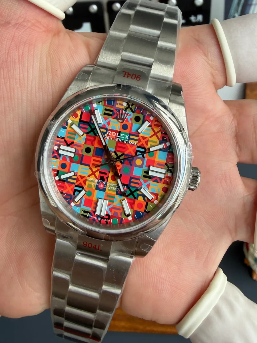 Rolex Oyster Perpetual 134300-0010 Multicoloured Jubilee-Motif Dial QF 41mm Super Clone Watch - Angle 3 - Jack Watches USA