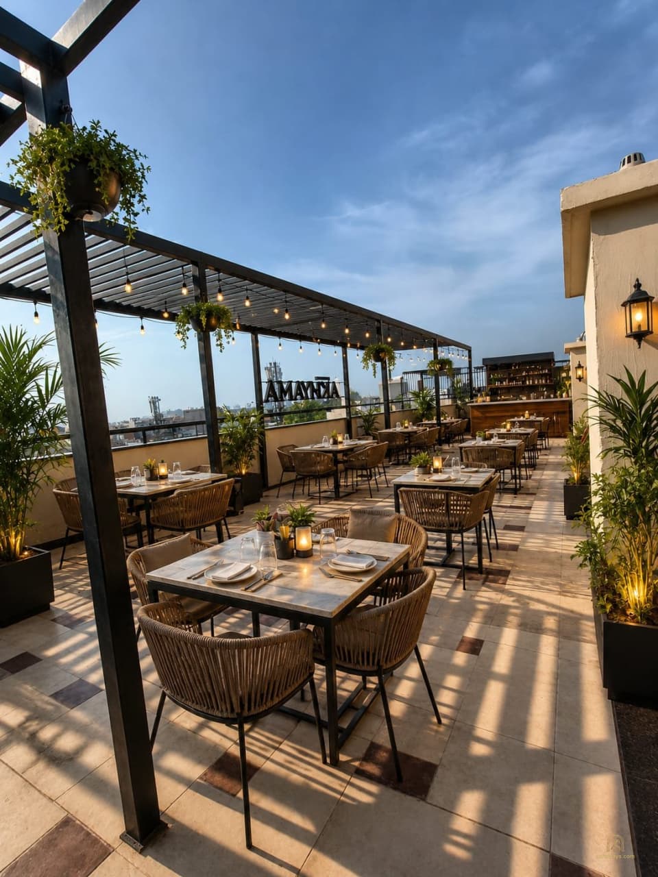 Terrace seating beneath an open canopy
