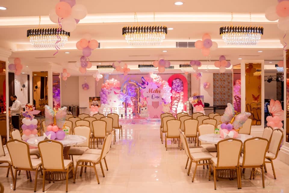 Avenue 56 banquet room with a decorated celebration stage