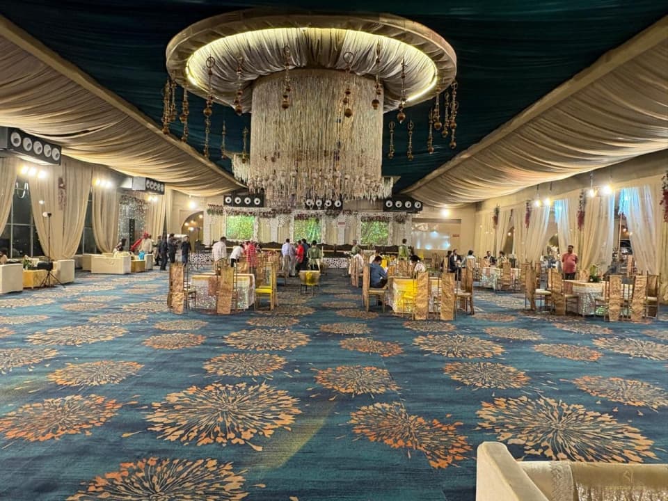 Covered reception hall with a central chandelier