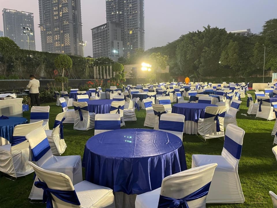 Lawn set with blue and white event seating