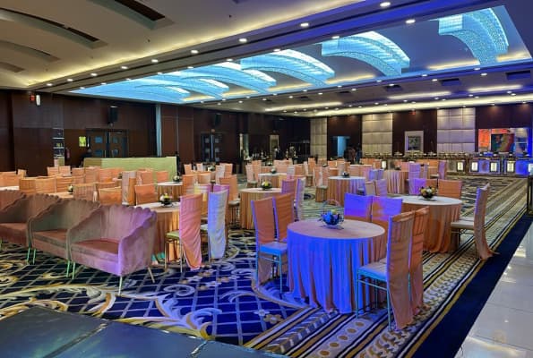 Event hall with blue ceiling lighting