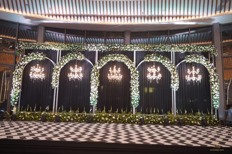 Indoor ceremony backdrop and patterned floor