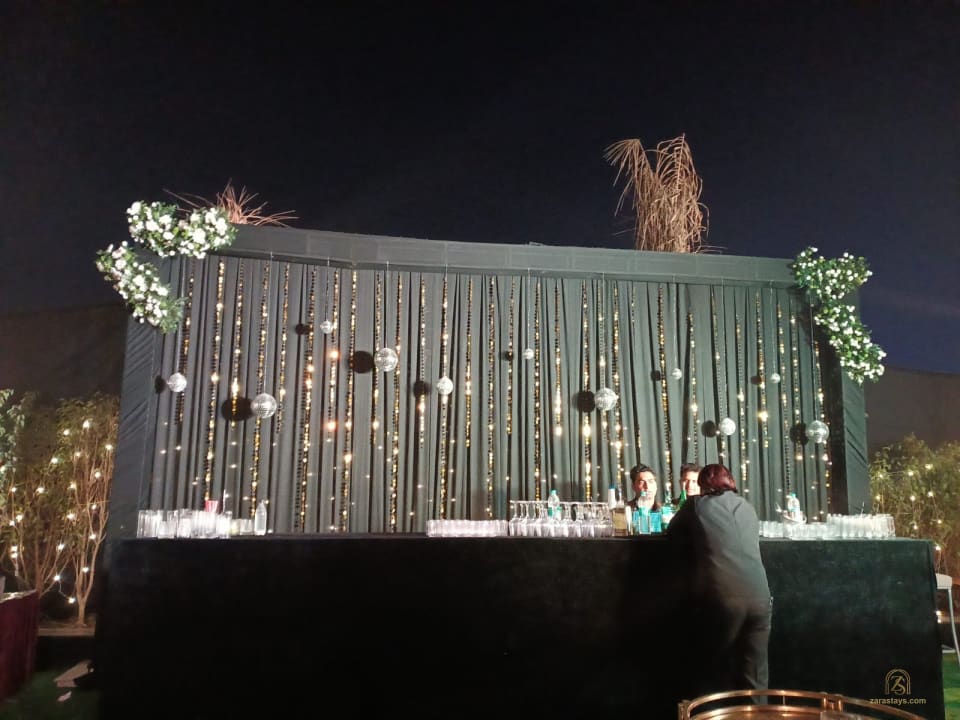 Outdoor service counter lit at night