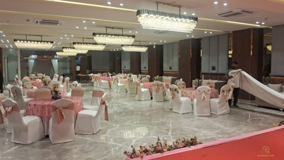 Banquet hall viewed from a red-carpeted stage
