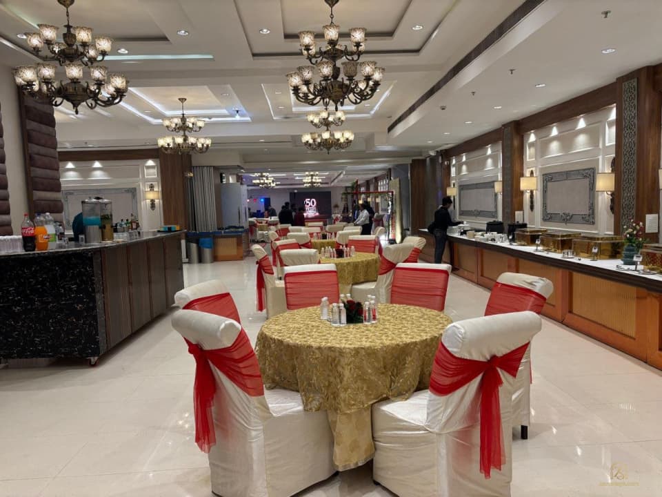 Banquet hall set with round dining tables