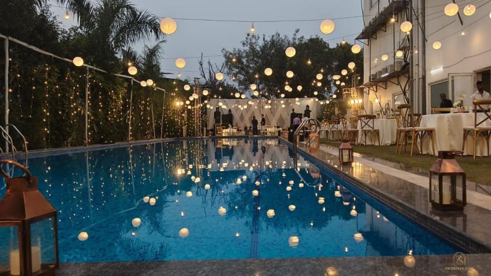 Poolside arranged with evening lights