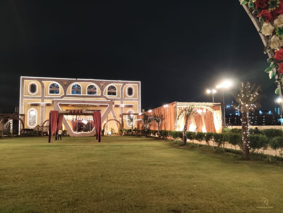 Lawn facing the Kaiser Palace event building at night