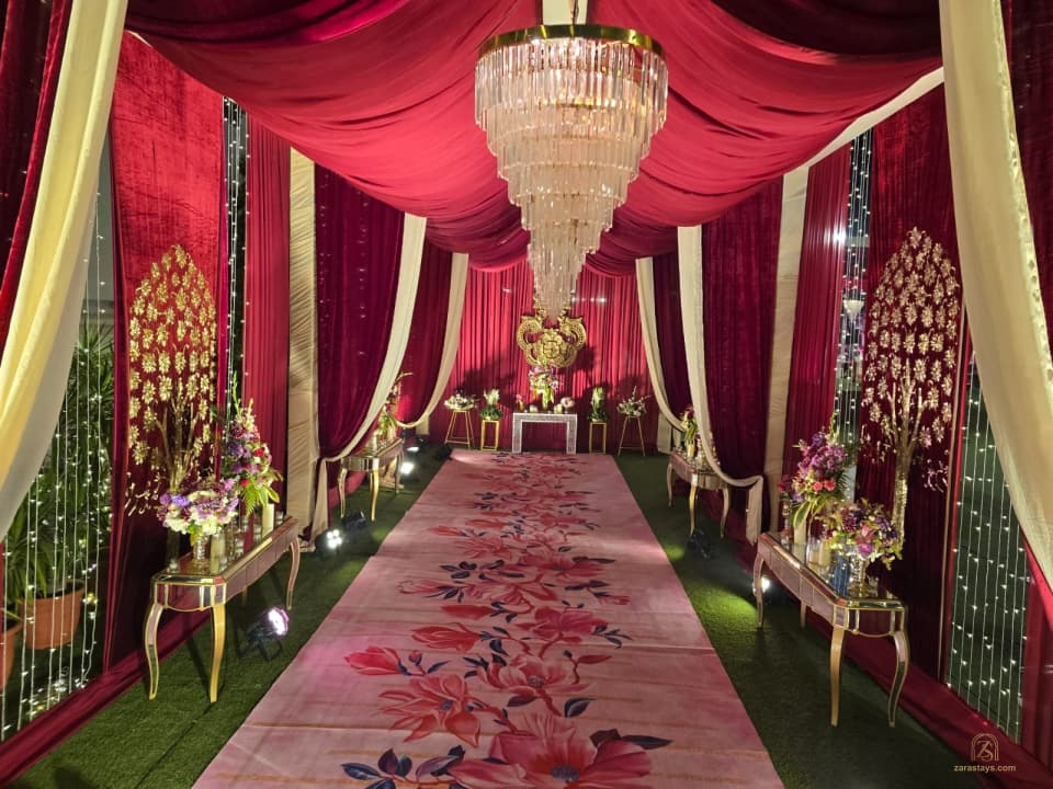 Red fabric and floral entry corridor