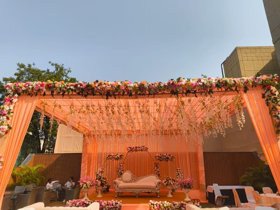 Peach floral canopy in the outdoor event area