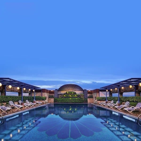 Swimming pool and terrace at dusk