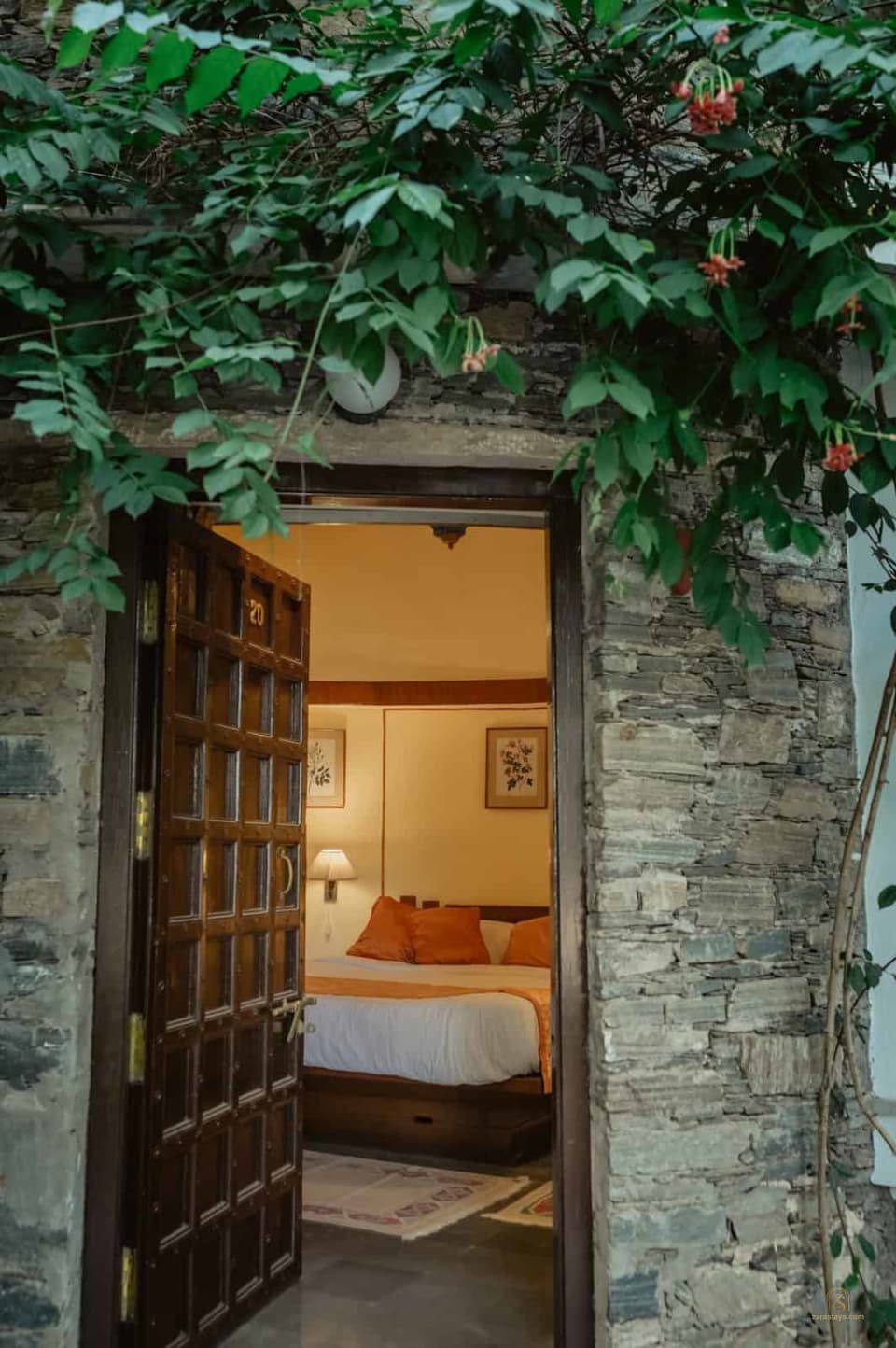A stone-framed guest room entrance at The Aodhi
