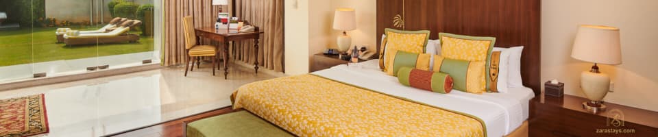 A guest room overlooking the gardens at The LaLiT Temple View
