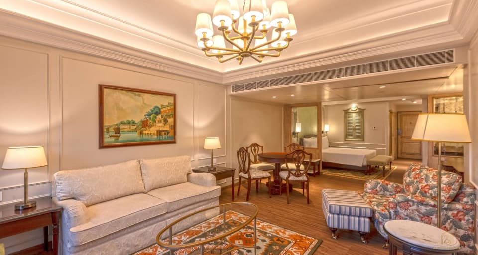 The sitting and dining area in a Namah Nainital suite