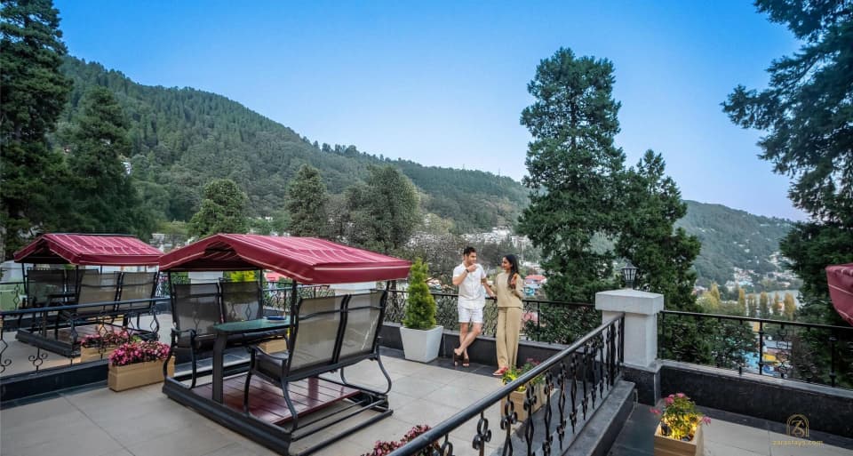 Outdoor seating looking towards the hills at Namah Nainital
