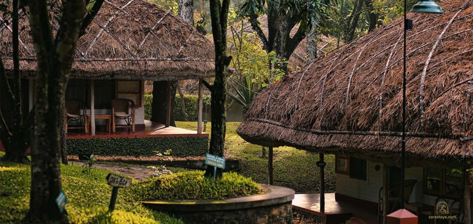 Elephant-grass roofs and greenery at Spice Village