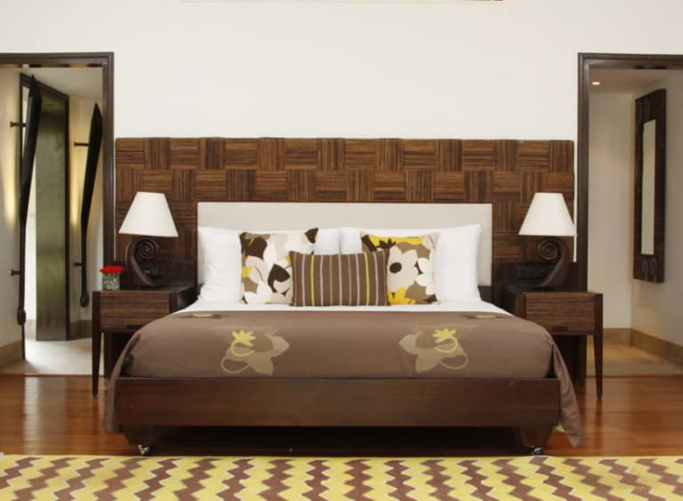 A suite bedroom at The LaLiT Bekal