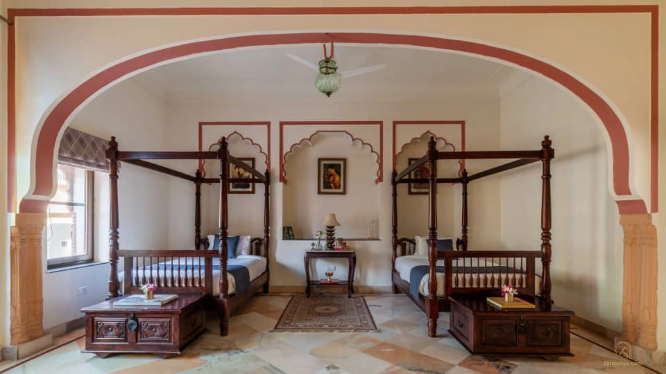 A twin bedroom at Laxmi Vilas Palace