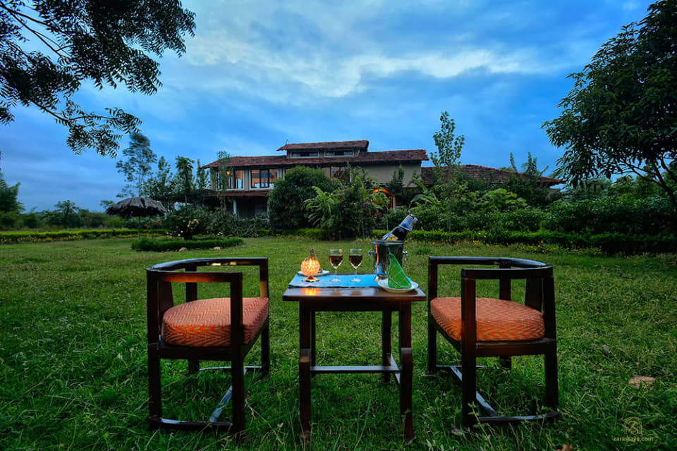 A table set on the lawn at Chitvan Jungle Lodge