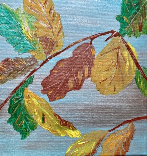 Autumn leaves on sliver green