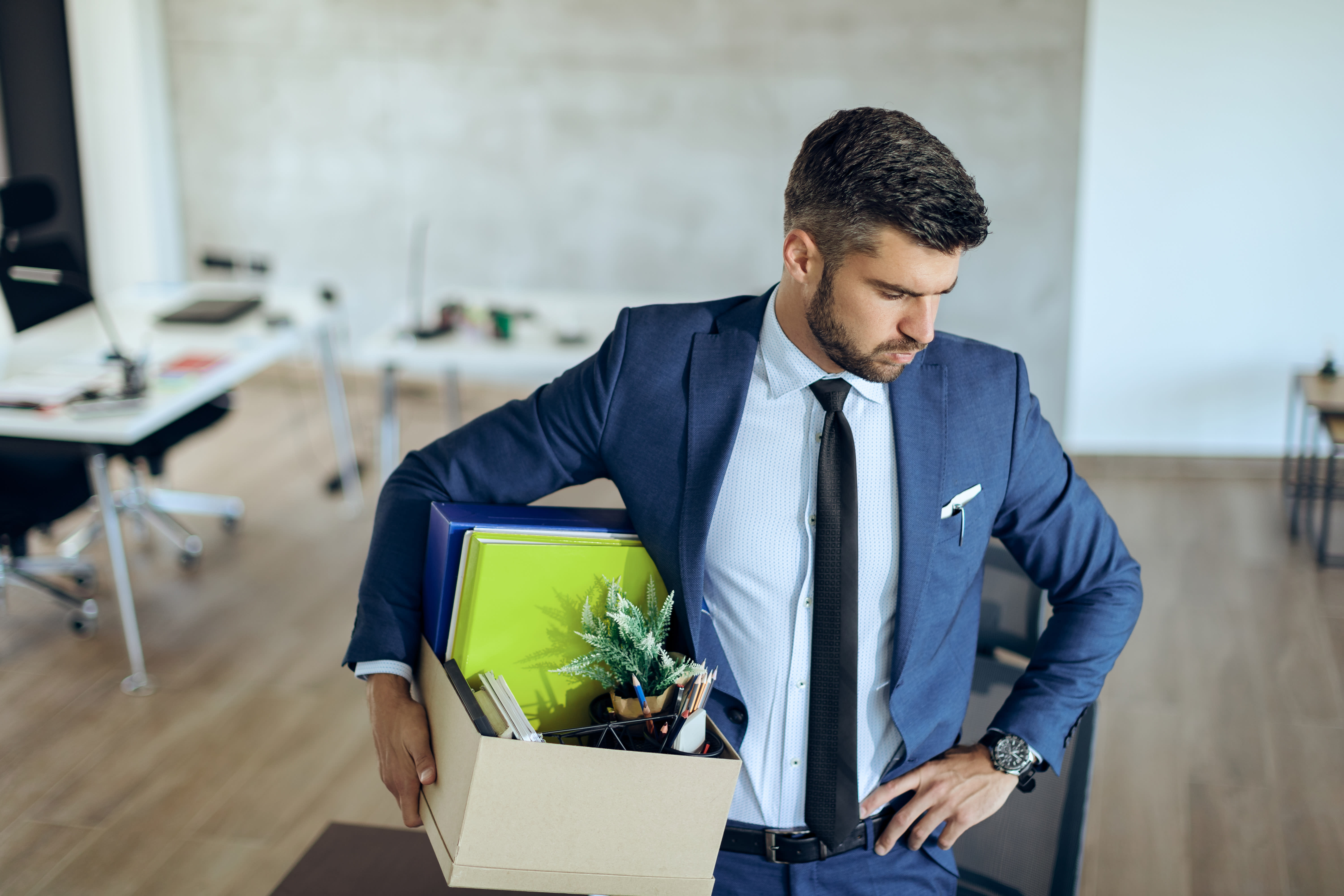 fired-businessman-feeling-worried-about-loosing-his-job.jpg