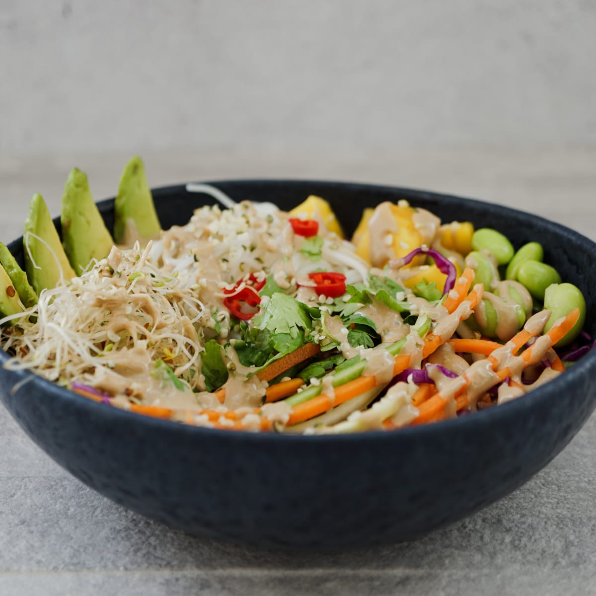 spring roll salad with tahini dressing on top