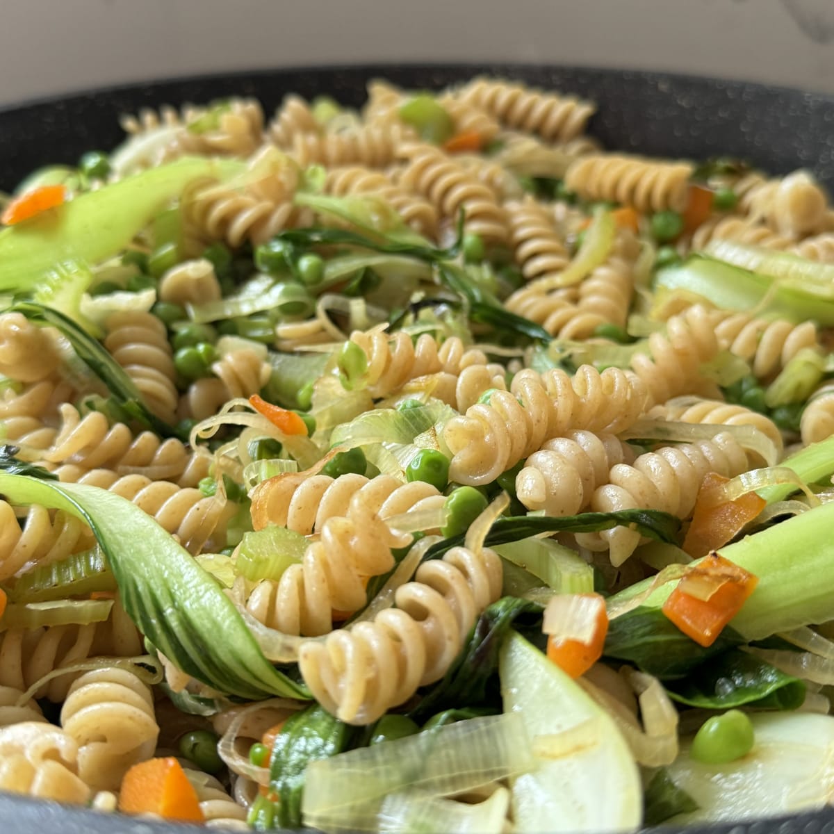 Pasta with vegetables and peas