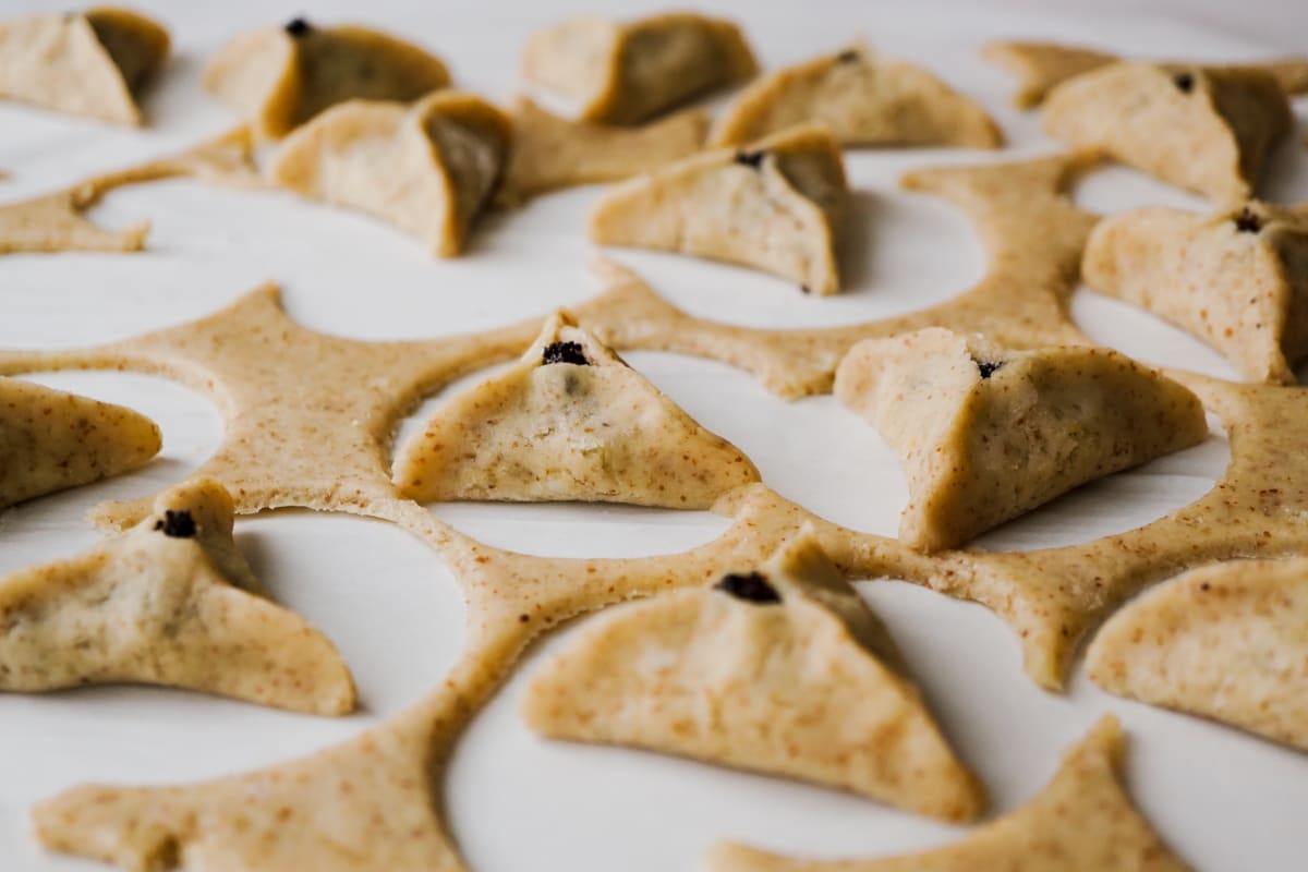 folded hamantaschens before baking