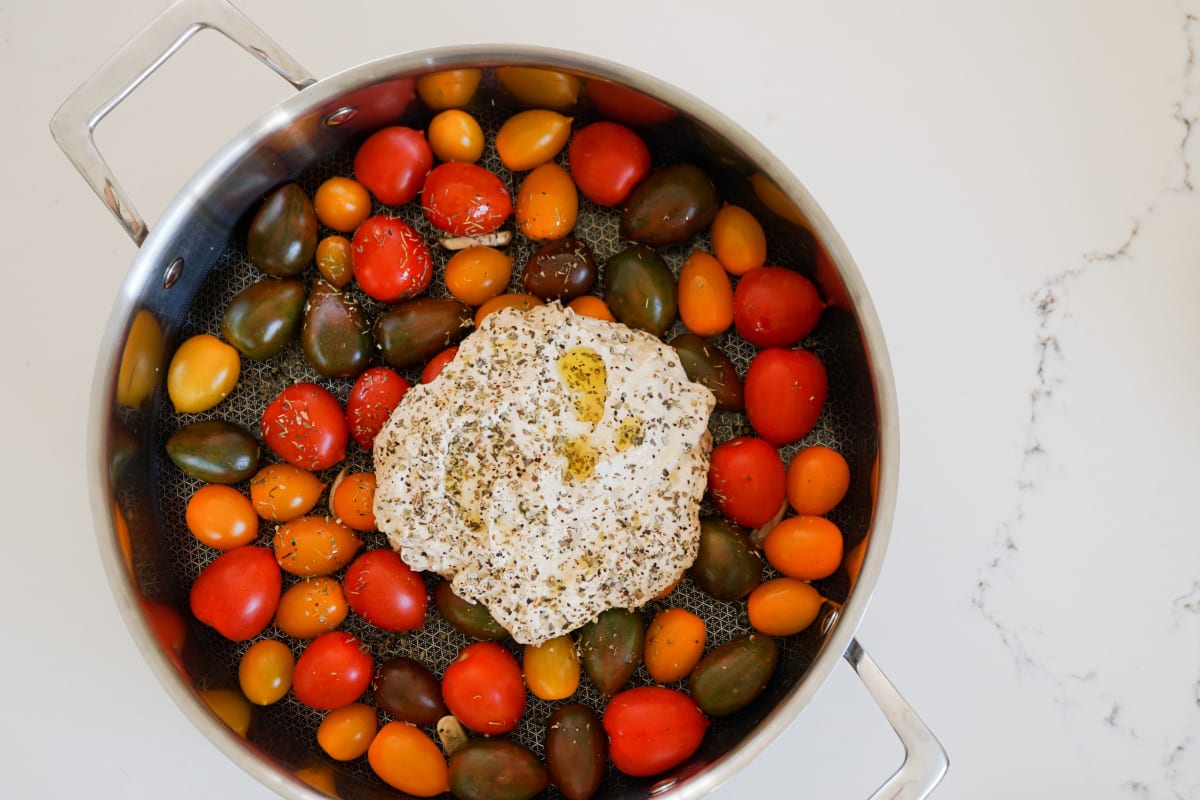 colorful cherry tomatoes with vegan feta and herbs