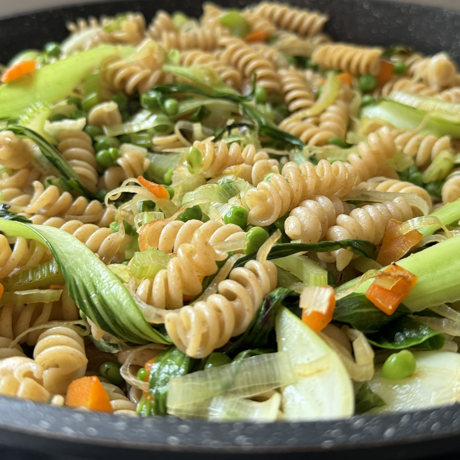 Pasta with vegetables and peas