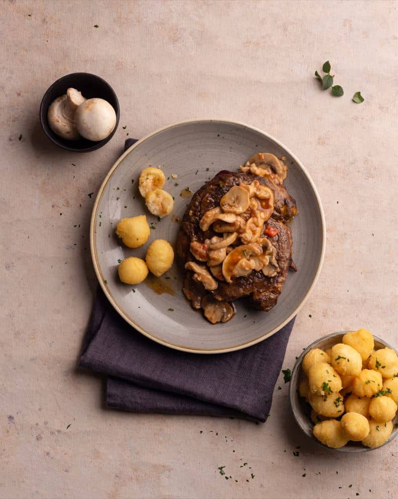 Lomo al champiñón con papas noisette