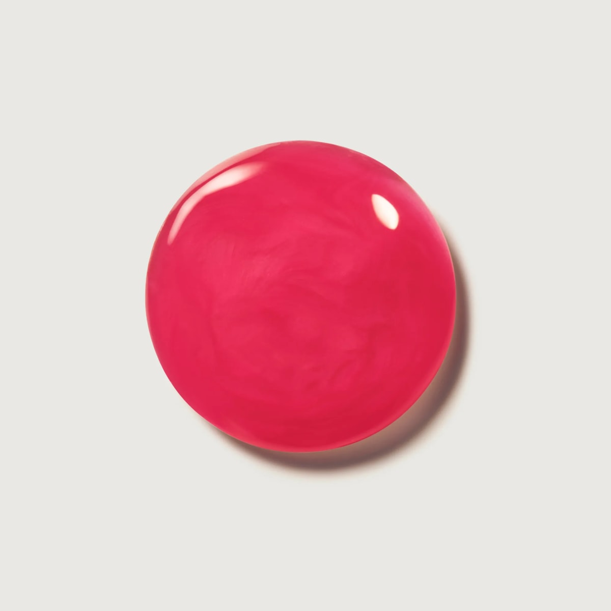 Pink Guava Lip Butter Balm bright pink tube or sheer bright-pink glossy lip swatch
