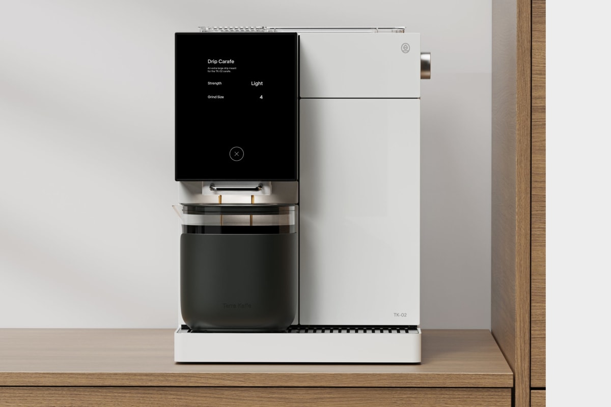 TK-02 brewing true drip coffee into a mug or carafe