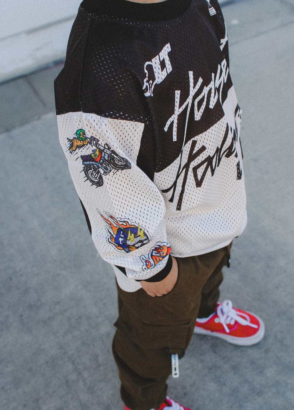 House of Hooligans jersey paired with khaki cargo pants