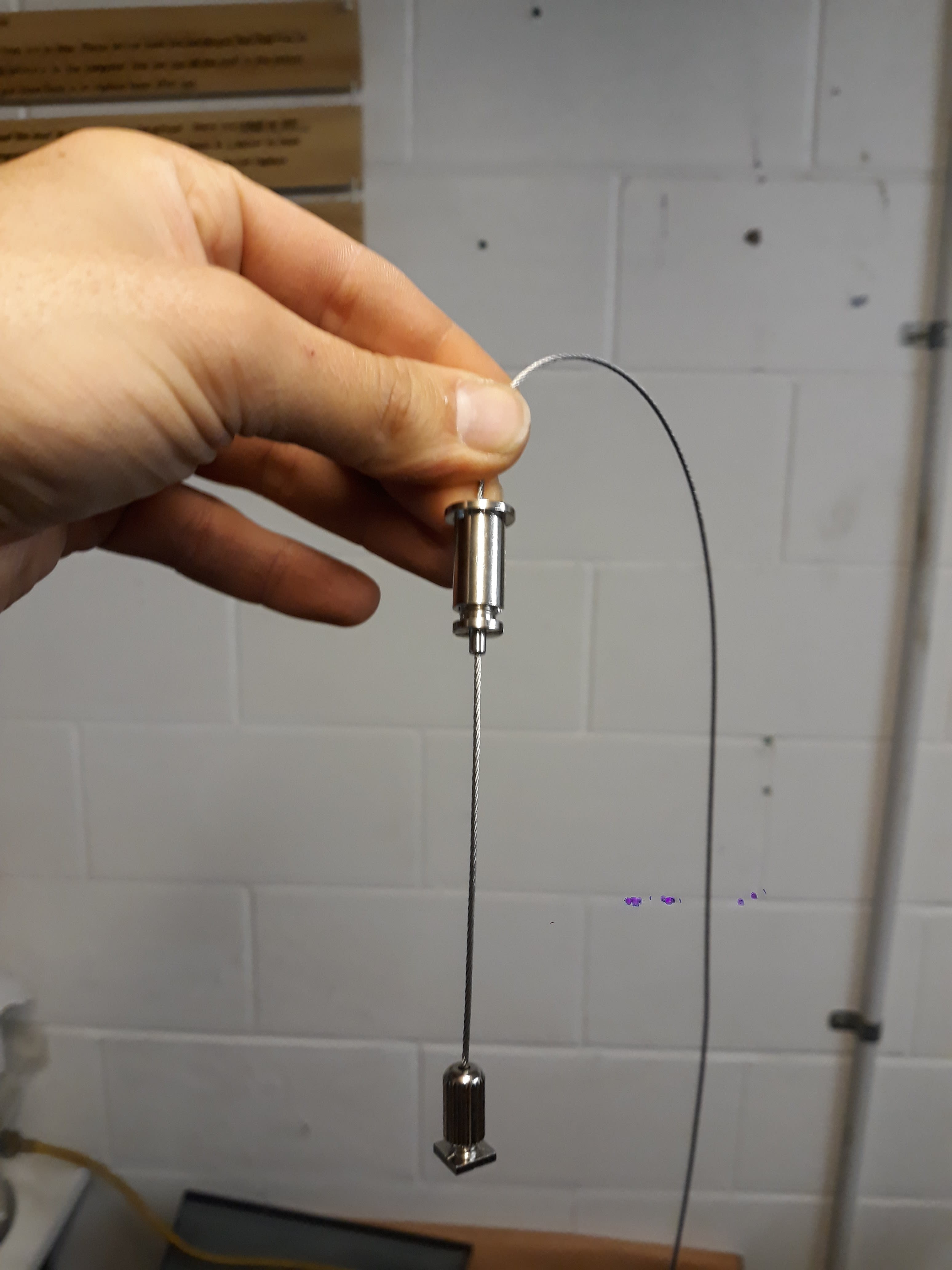 Stainless steel wire light hanger