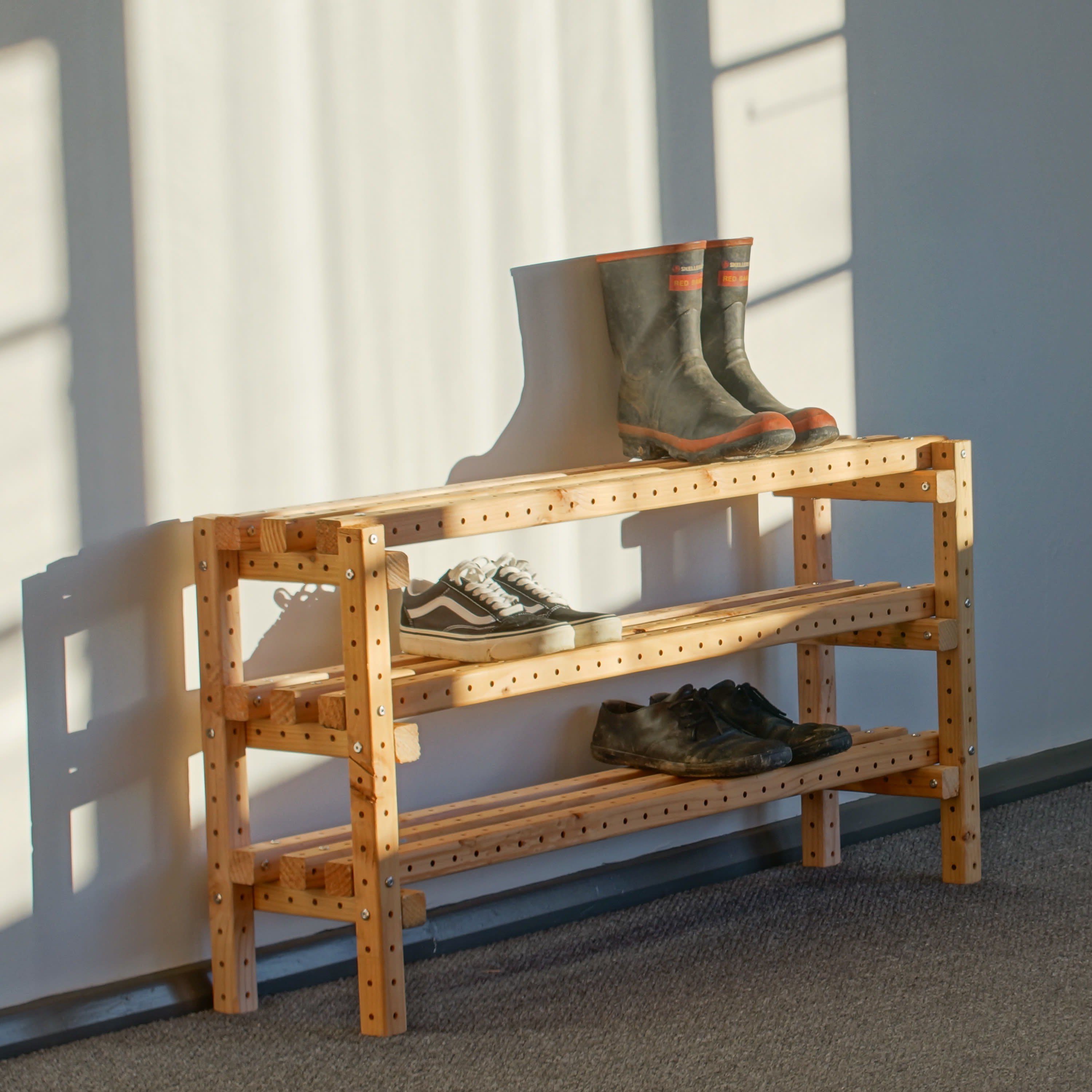 A shoe rack made from Grid Beam.