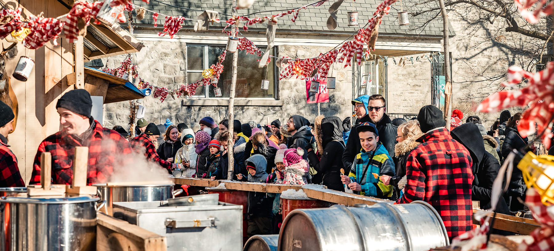 A group at the sugar shack on a street in Montréal
