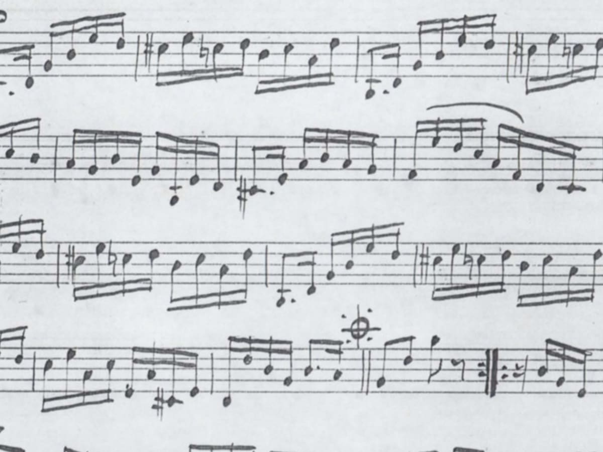 Une ancienne partition musicale manuscrite.