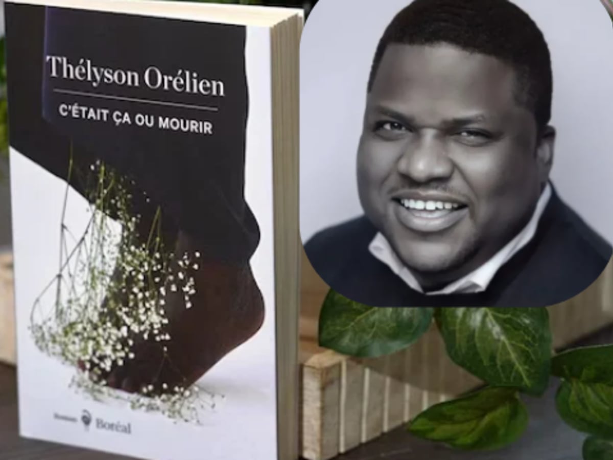 L'auteur Thélyson Orélien posant devant son livre