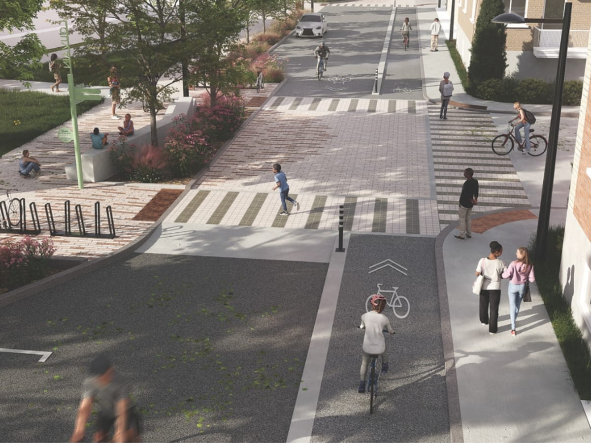 Aperçu 3D montrant une rue avec la chaussée, une piste cyclable, des passages piéton et des places de stationnement